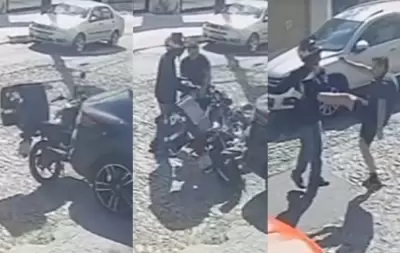 ‘Você é um lixo, meu carro custa R$ 1 milhão’: dono de Porsche derruba moto de propósito e agride entregador ao sair de garagem; assista vídeo